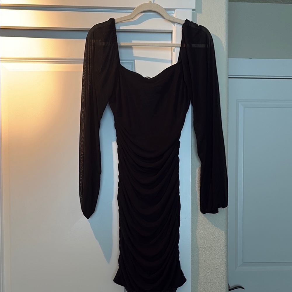 Body con mini dress with mesh sleeves